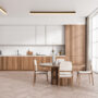 Light kitchen interior with eating table and chairs, kitchenware and window