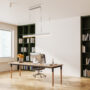 A modern office interior featuring a desk with a computer, bookshelves filled with books, and a large window. Bright and clean look. Concept of workspace. 3D Rendering