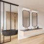 Cozy home bathroom interior with double sink and bathtub behind glass partition
